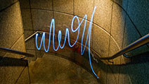 Photograph of a photographer's signature, drawn using the technique of light painting.